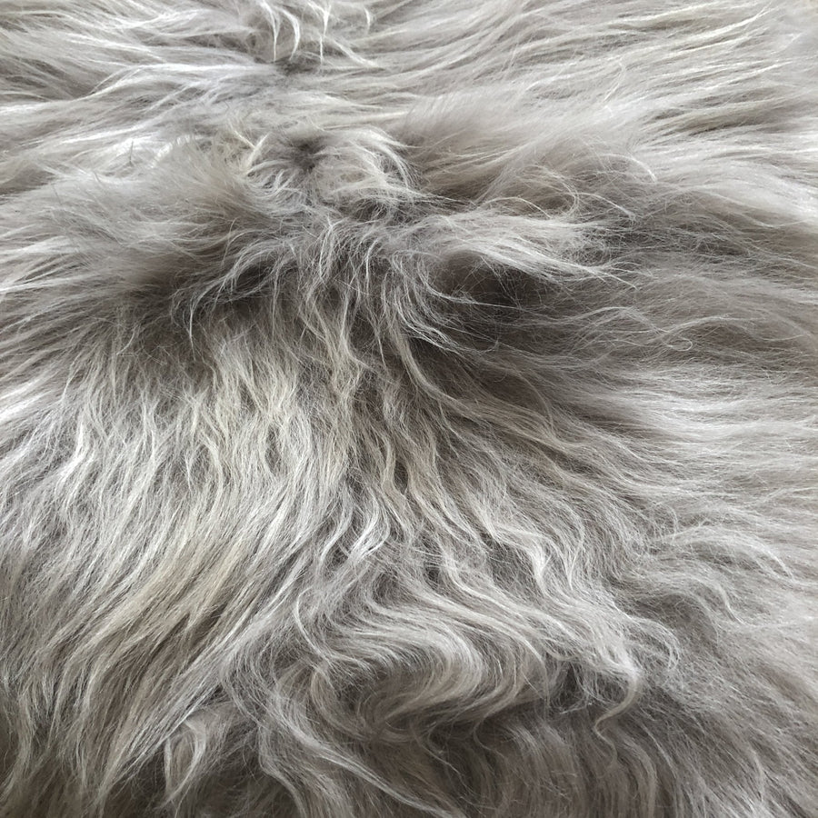 Luxury Icelandic sheepskin throw, premium long-haired dove grey sheepskin rug, ethically sourced, sustainable, handcrafted, best-selling by Wildash London at brixbailey.com