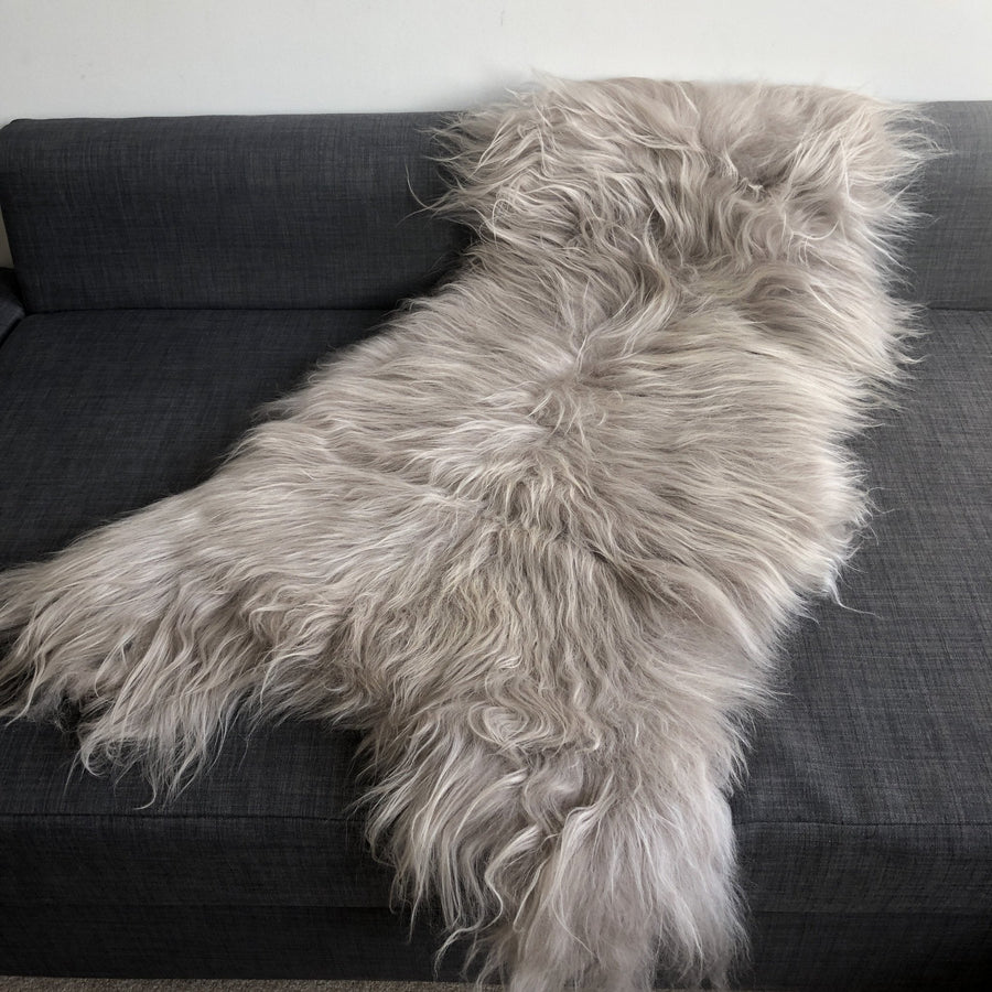 Luxury Icelandic sheepskin throw, premium long-haired dove grey sheepskin rug, ethically sourced free-range organic fur by Wildash London at brixbailey.com