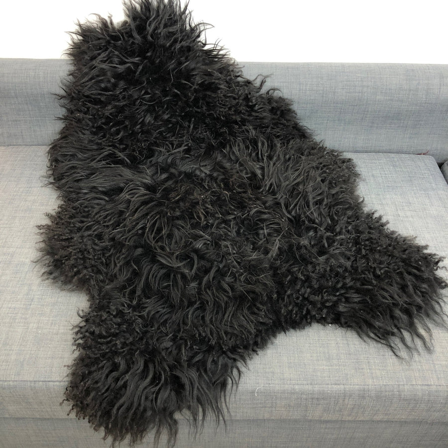 Premium Icelandic sheepskin rug, natural black, long curly hypoallergenic fur, luxury free-range ethically sourced hide by Wildash London at brixbailey.com