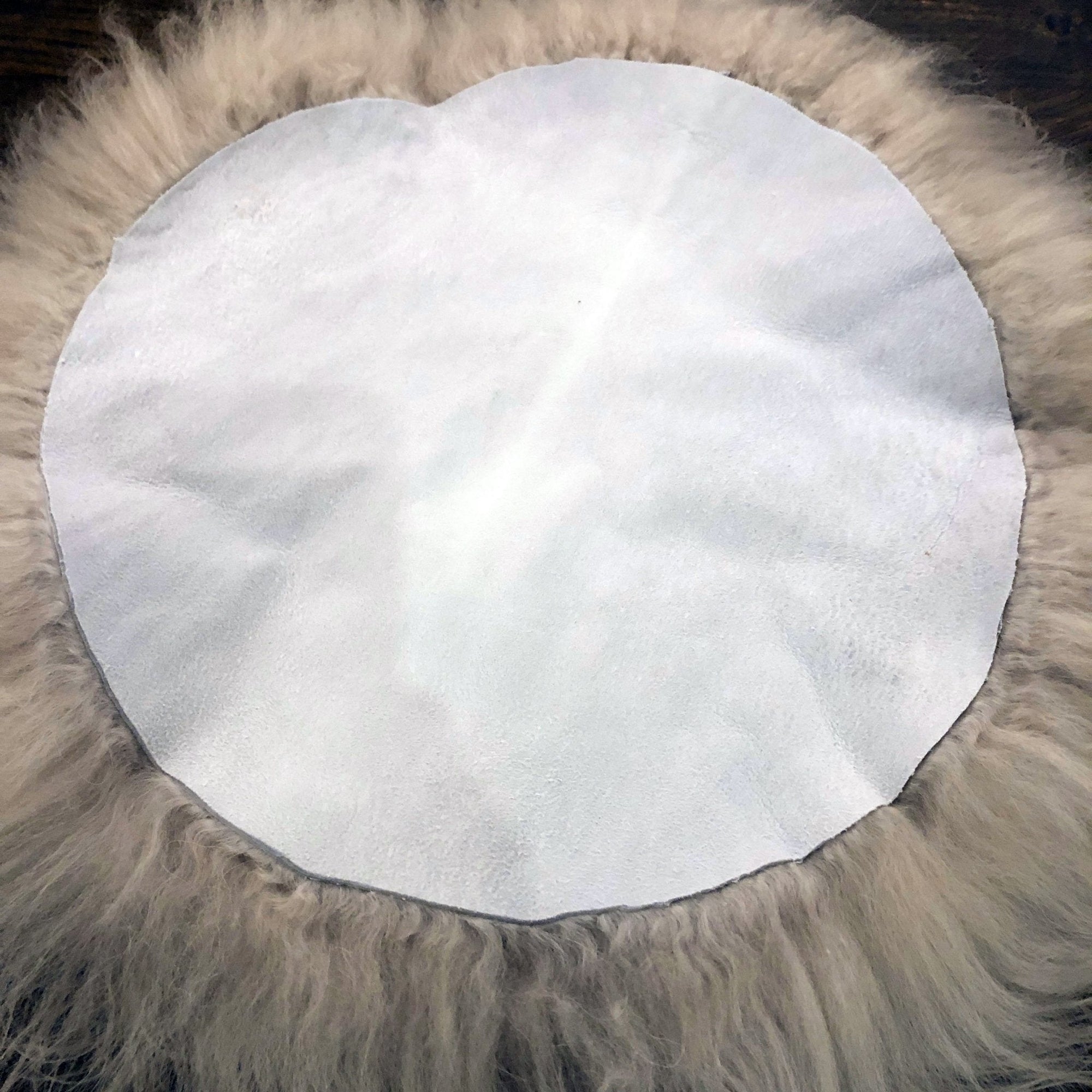 Premium Icelandic sheepskin roundie seat cover in dove grey, 35cm, luxury natural British sheepskin, handcrafted, sustainable, hypoallergenic by Wildash London at brixbailey.com