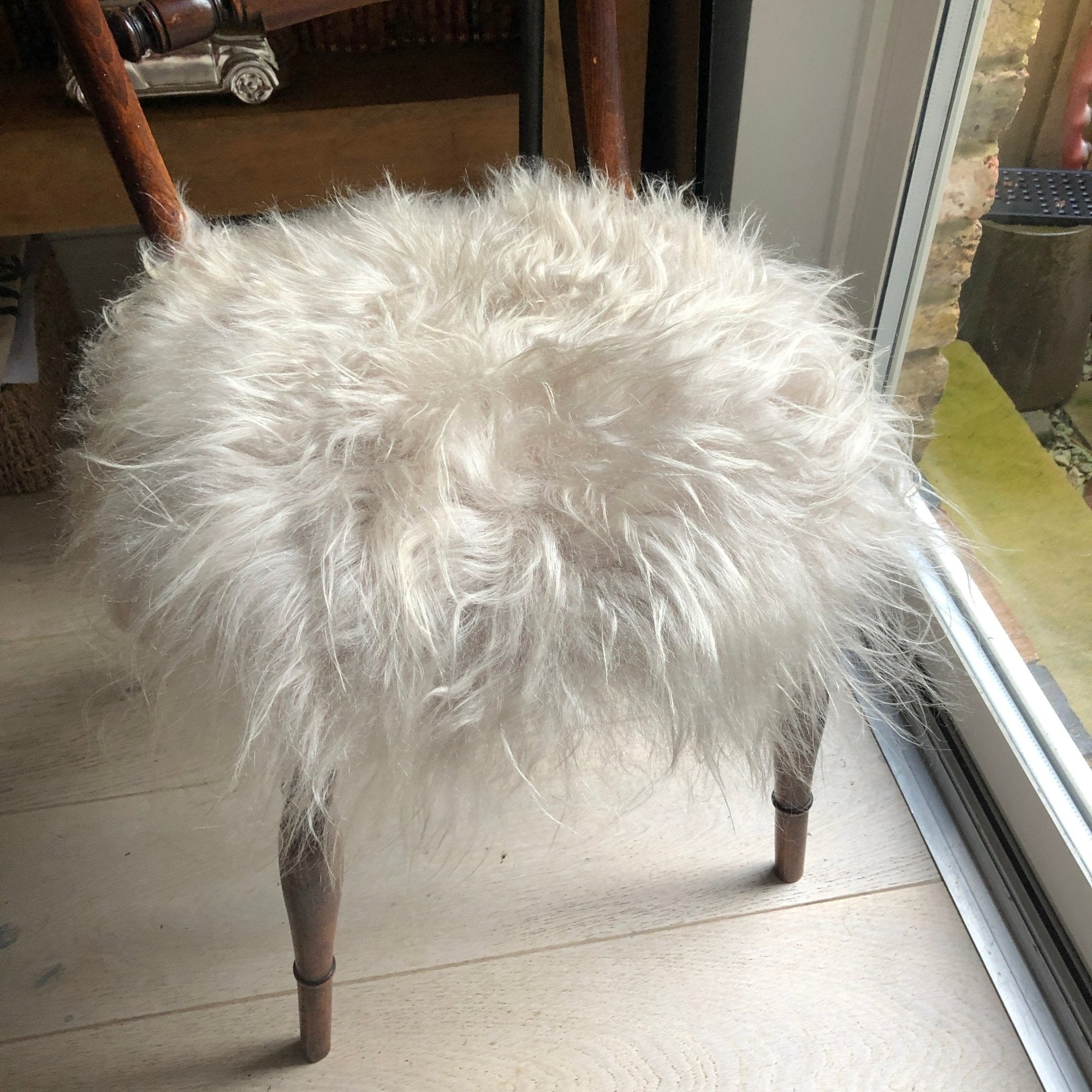 Luxury premium British sheepskin seat cover, 100% natural hypoallergenic fur, handcrafted sustainable eco-friendly, best-selling dove grey roundie by Wildash London at brixbailey.com