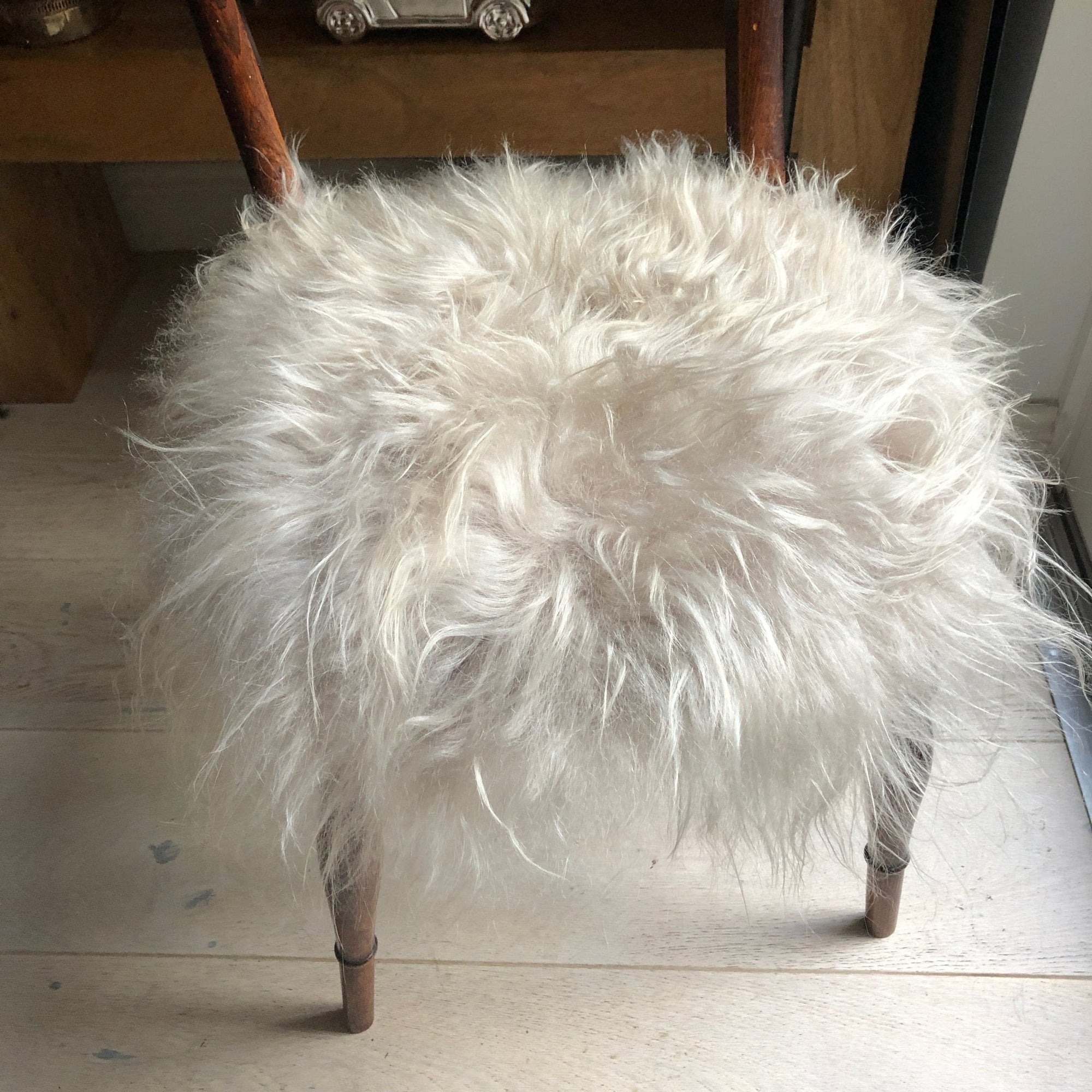 Luxury premium British sheepskin seat cover, handcrafted natural dove grey roundie, sustainable hypoallergenic fur, stylish and cozy by Wildash London at brixbailey.com