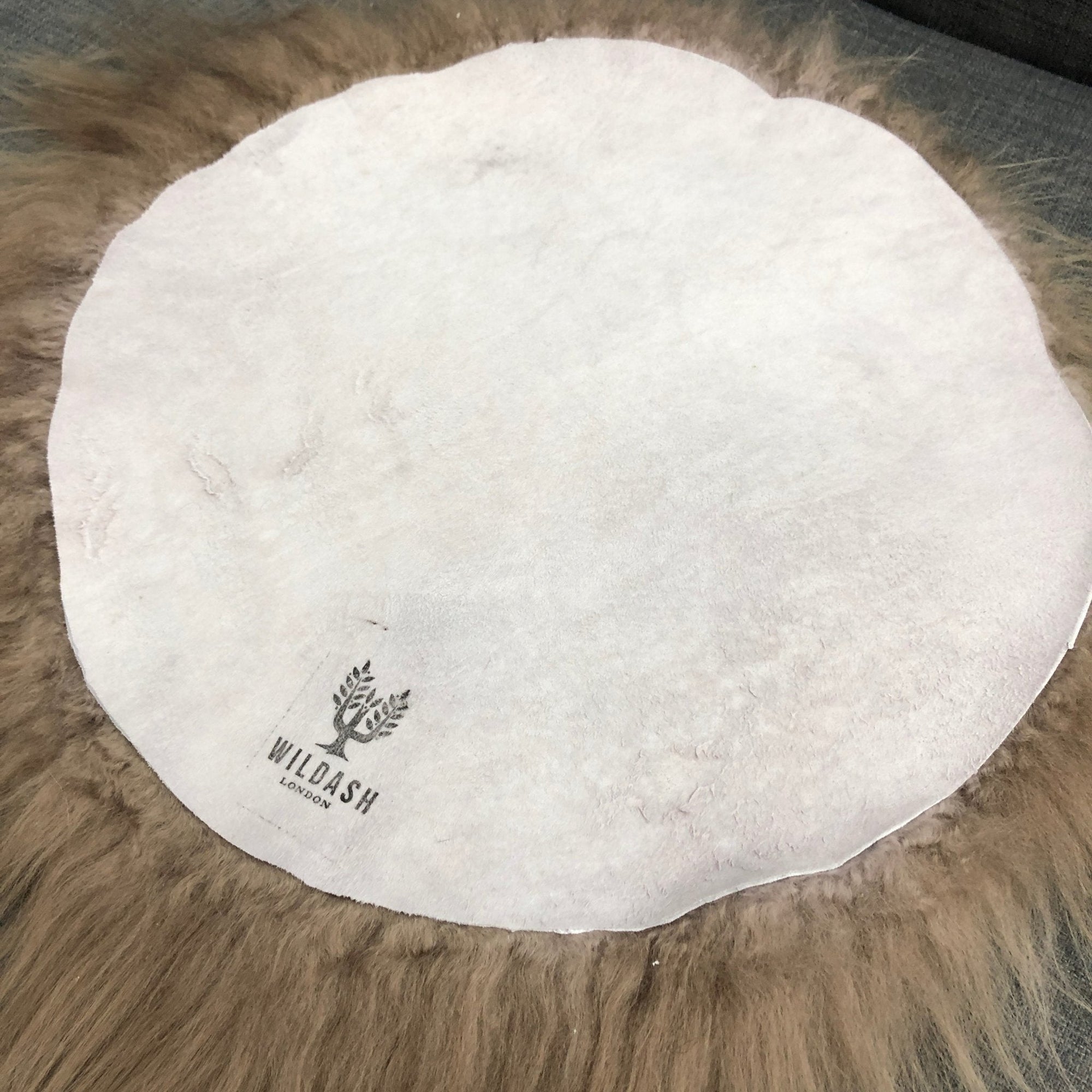 Luxury Icelandic sheepskin roundie seat cover in taupe, premium natural long fur, handcrafted hypoallergenic, best-selling home decor by Wildash London at brixbailey.com