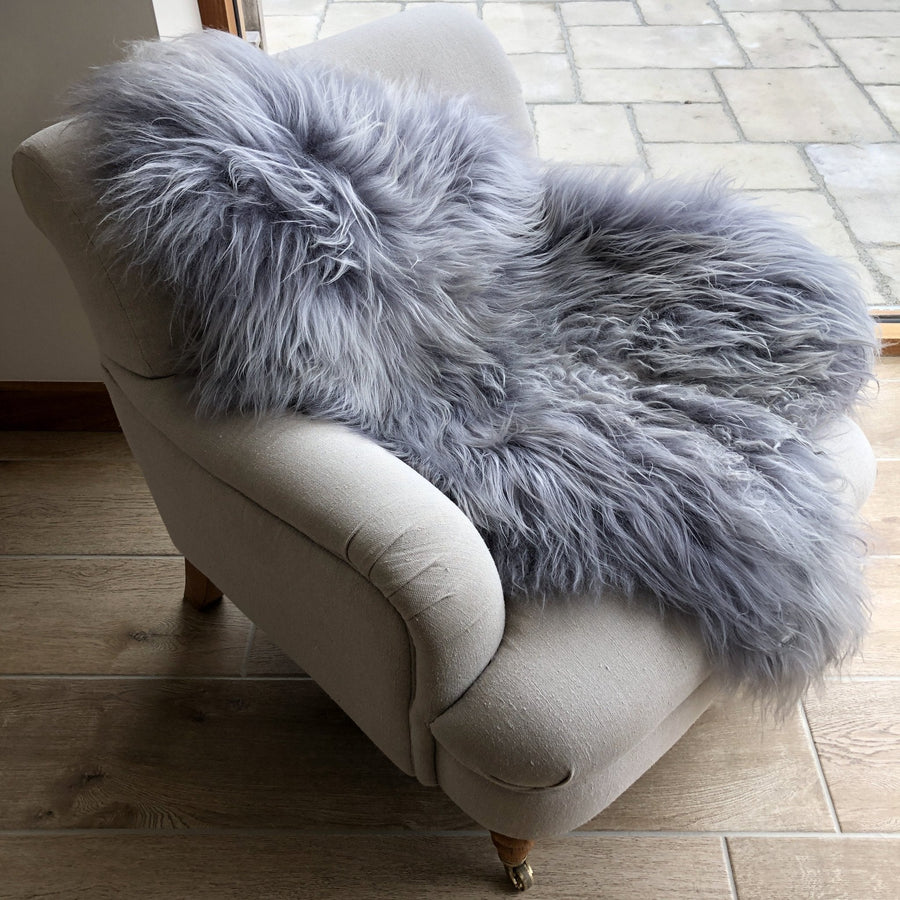 Premium Icelandic sheepskin rug in cool grey, long fur luxury throw, ethically sourced, sustainable, best-selling home decor by Wildash London at brixbailey.com