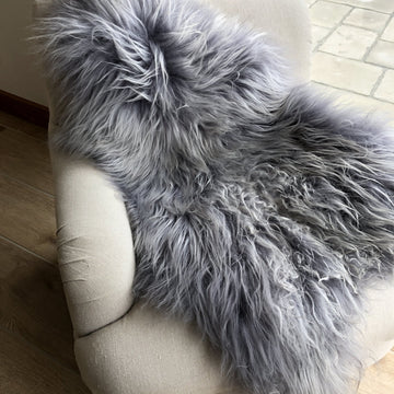 Premium Icelandic long fur sheepskin rug in cool grey, luxury handcrafted throw, ethical sustainable hide, best-selling medium size by Wildash London at brixbailey.com