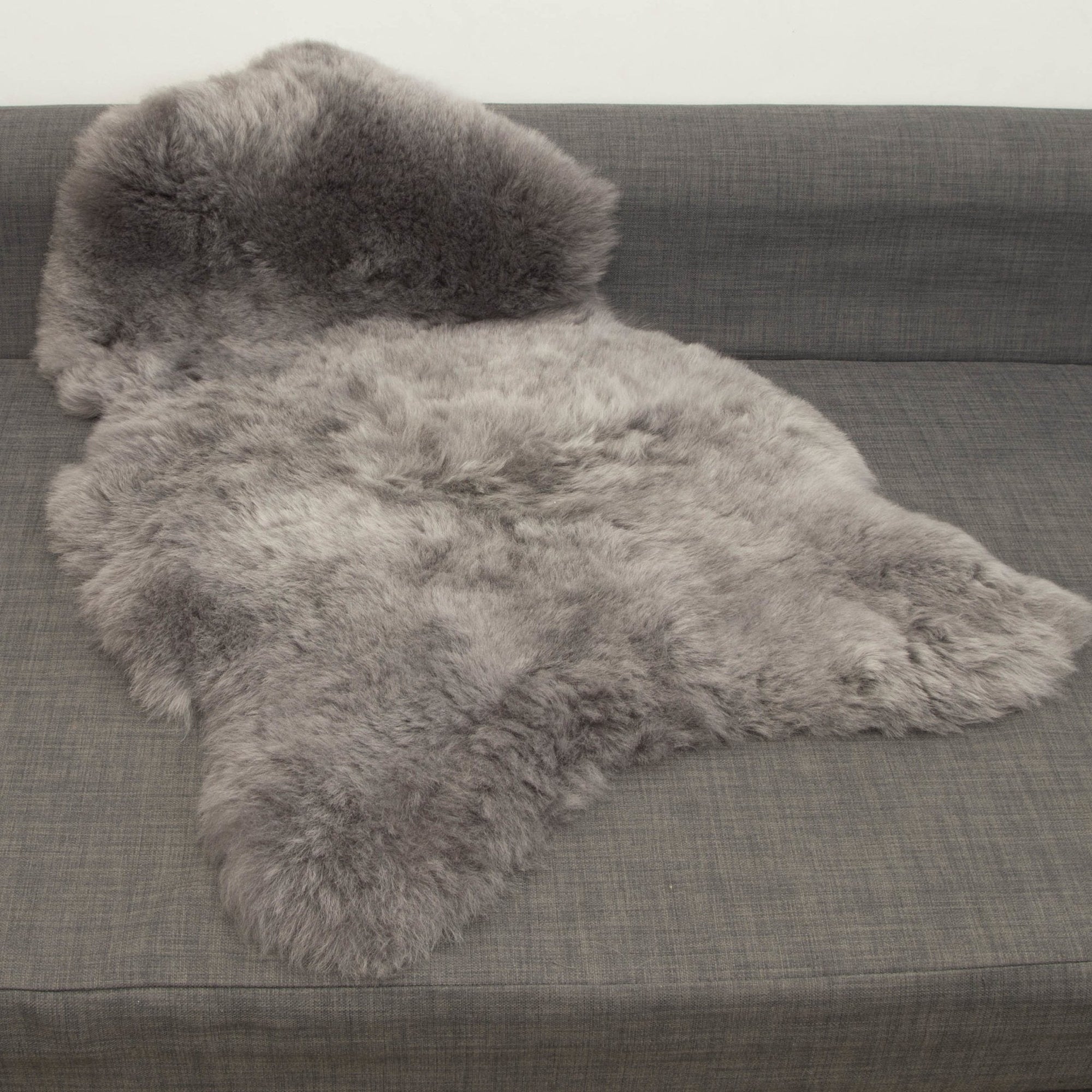 Luxury Icelandic sheepskin rug in cool grey, premium 50mm shorn fur, ethically sourced, sustainable and hypoallergenic by Wildash London at brixbailey.com