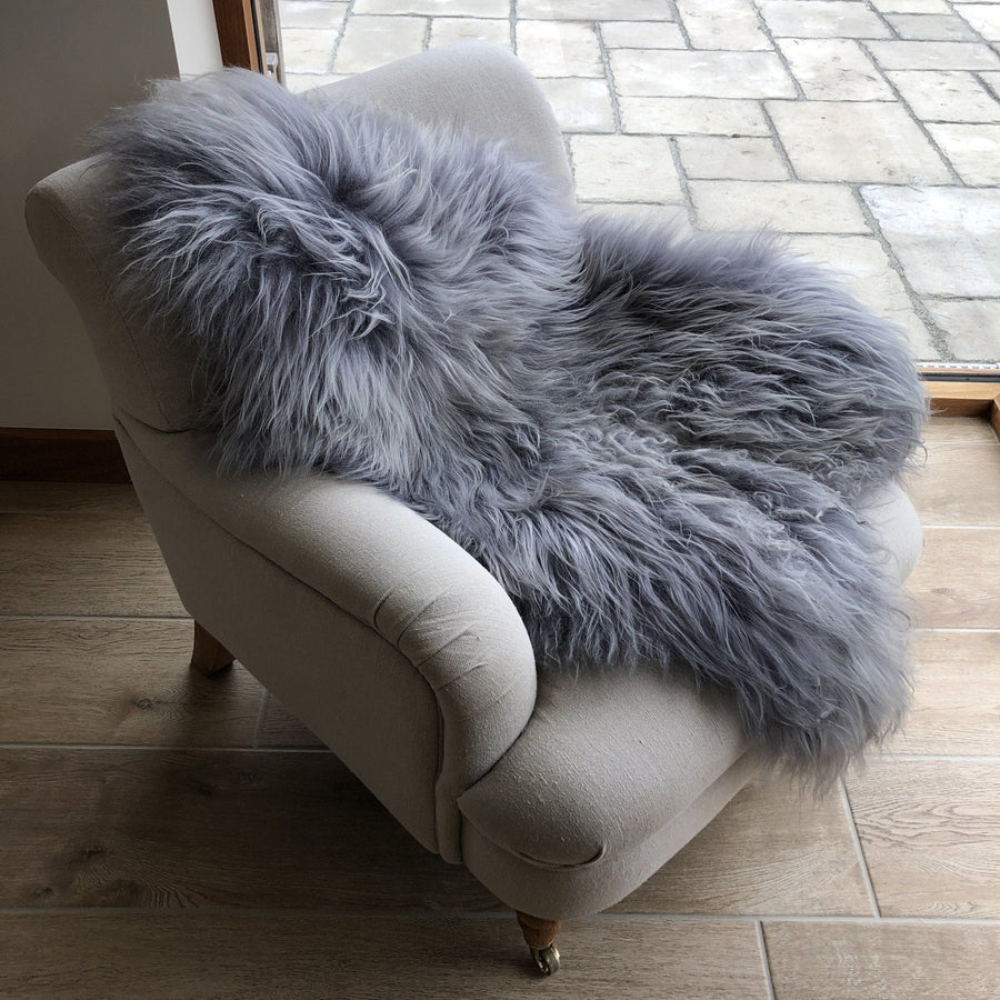 Luxury Icelandic long fur sheepskin rug in cool grey, premium handcrafted sustainable hide, stylish Nordic decor by Wildash London at brixbailey.com