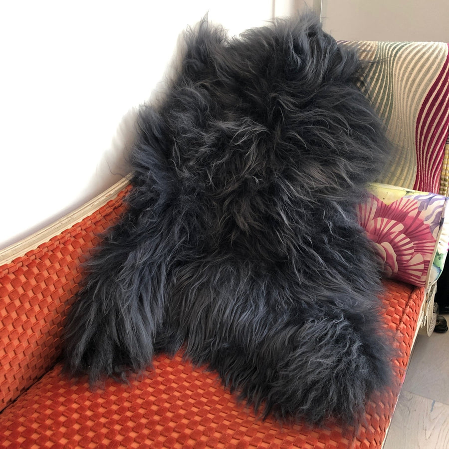 Luxury Icelandic sheepskin rug, premium long fur graphite grey, stylish sustainable home decor by Wildash London at brixbailey.com