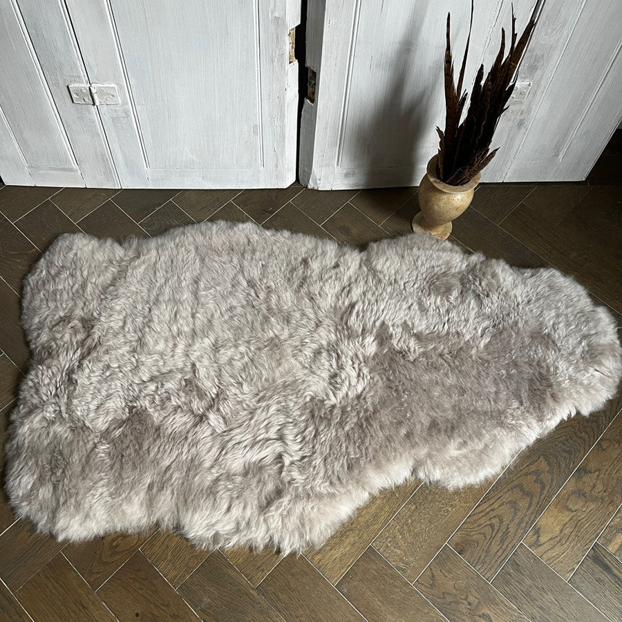 Luxury Icelandic sheepskin throw in dove grey, large premium shorn sheepskin rug, best-selling organic free-range fur by Wildash London at brixbailey.com