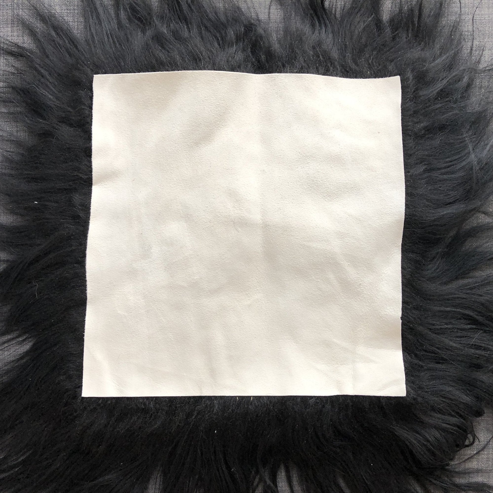 Luxury natural black Icelandic sheepskin seat cover, premium undyed fur, handcrafted, sustainable, hypoallergenic, 37cm square by Wildash London at brixbailey.com