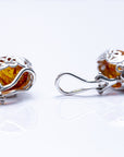 Floral Frame Oval Amber Clip On Earrings