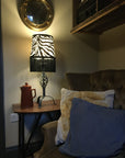 Zebra print velboa french drum lampshade, with black fringe and braid