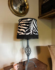 Zebra print velboa french drum lampshade, with black fringe and braid