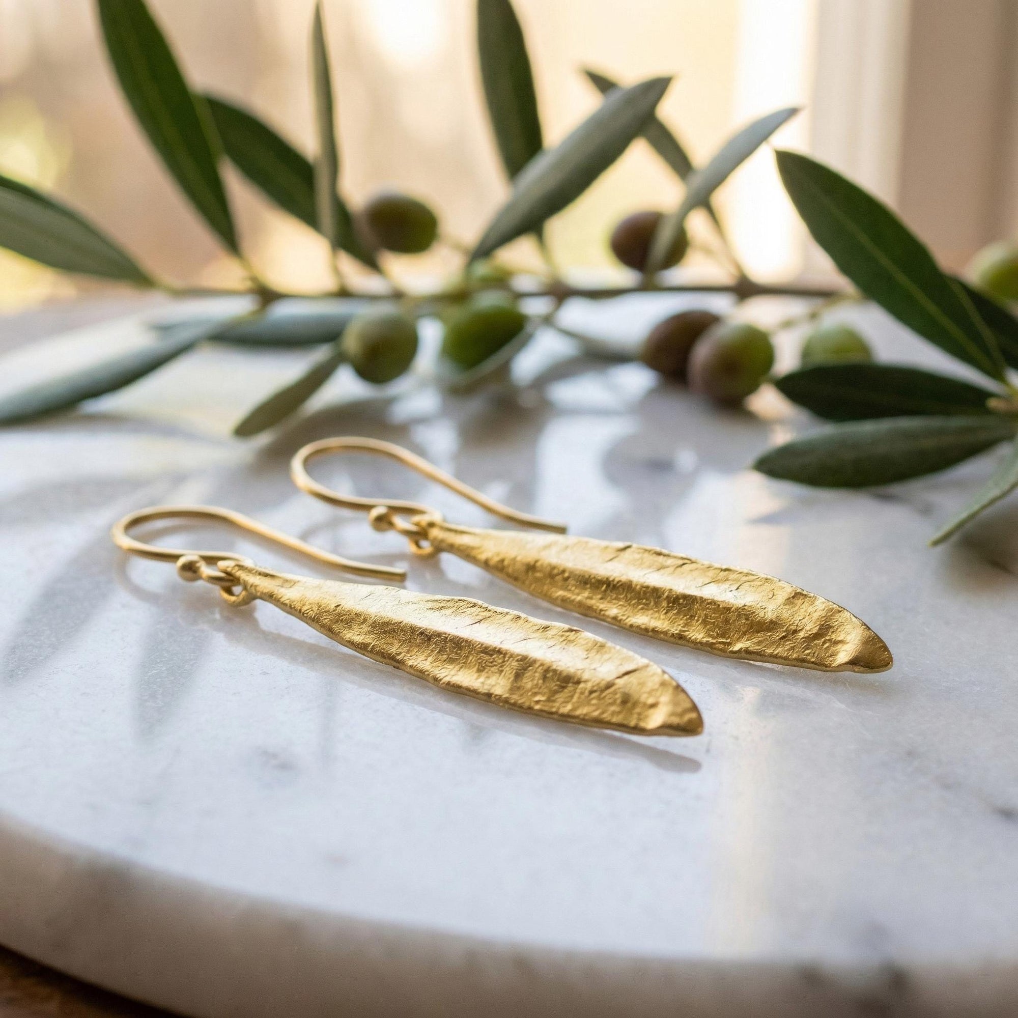 Every day Leaf earrings gift for women in Sterling recycled Silver or Gold Plated. Olive symbolize peace, protection, and fertility.