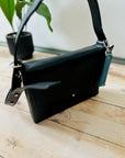 Versatile KOKUKA Black Bag – Stylish & Functional Leather Accessory by eleriinseim at www.brixbailey.com