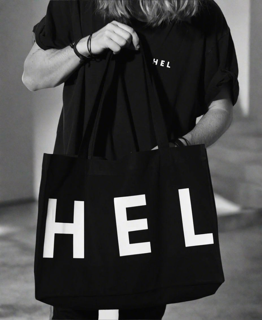 Premium handprinted black shopper bag, limited edition, organic cotton, recycled polyester, fair trade, made in Finland by WWOOLLFF CO. at brixbailey.com