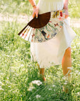 Floral Silk Fan with Toucan design and luxurious Gold tassel, part of the Mysa Collection