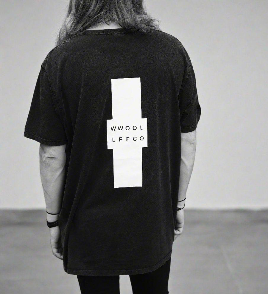 Luxury limited edition oversized black tee, handprinted organic cotton, unisex premium fit, fair trade certified by WWOOLLFF CO. at brixbailey.com