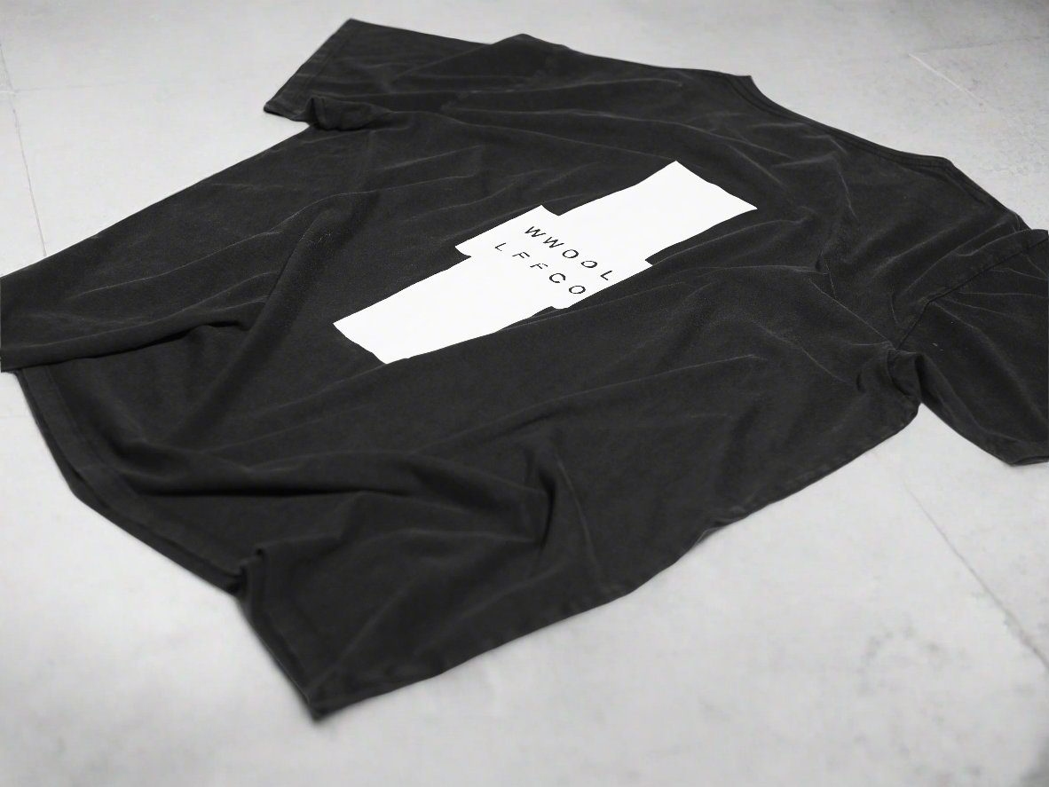 Premium handprinted oversized black tee, limited edition organic cotton unisex shirt, designed in Helsinki, fair trade certified by WWOOLLFF CO. at brixbailey.com