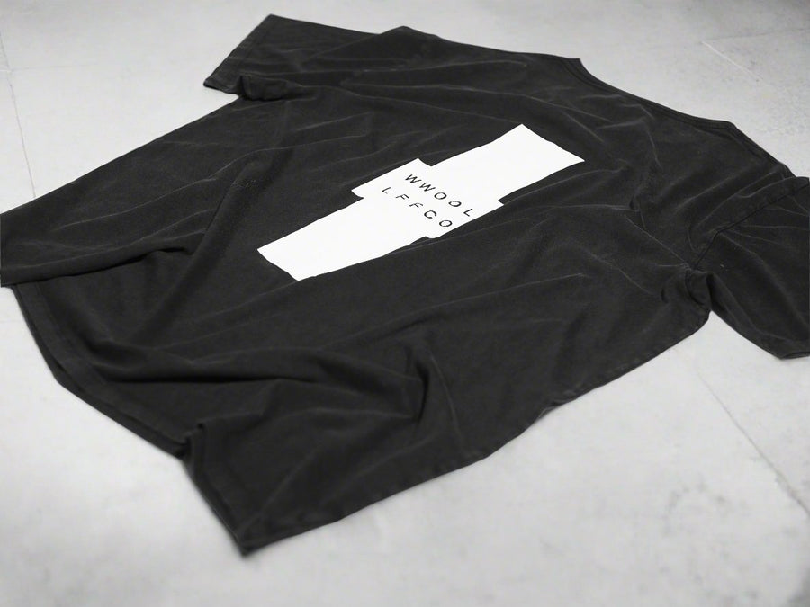 Premium handprinted oversized black tee, limited edition organic cotton unisex shirt, designed in Helsinki, fair trade certified by WWOOLLFF CO. at brixbailey.com