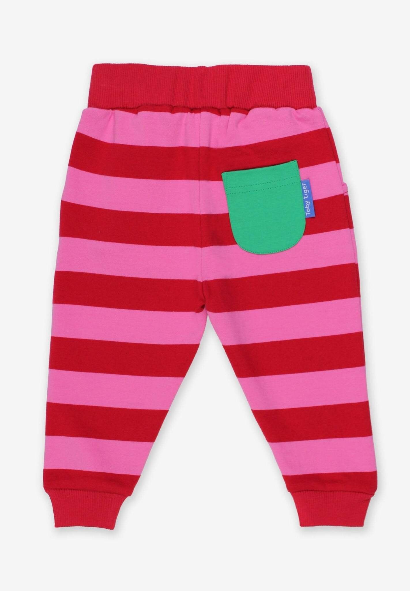 Premium pink and red striped organic cotton baby jogger pants, stylish and comfortable for playtime by Toby Tiger at brixbailey.com