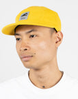 Yellow Five Panel Cap with Stinky Character