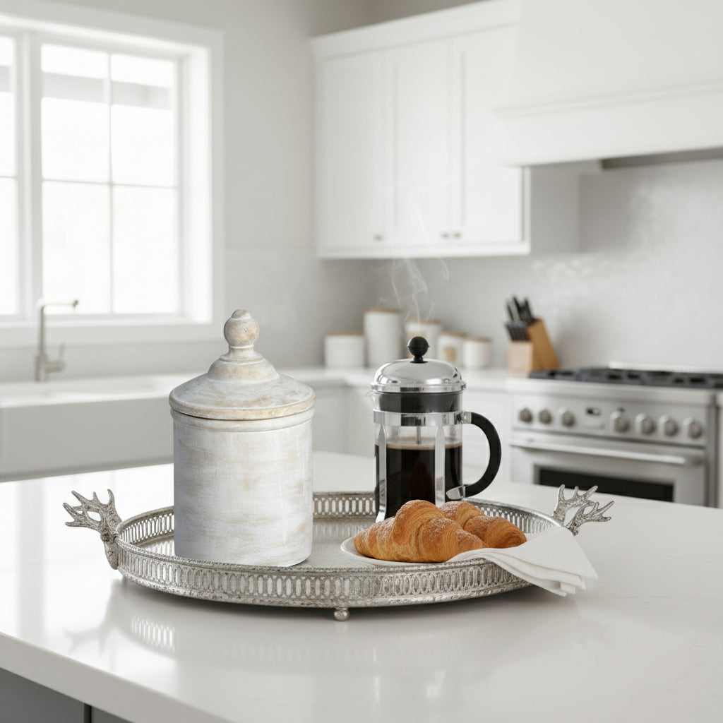 Antique white stone canister with European-inspired design, subtle patina, and elegant proportions for home decor or storage. by sostter at brixbailey.com