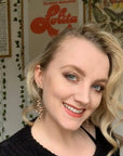 Gold and leopard lightning bolt earrings