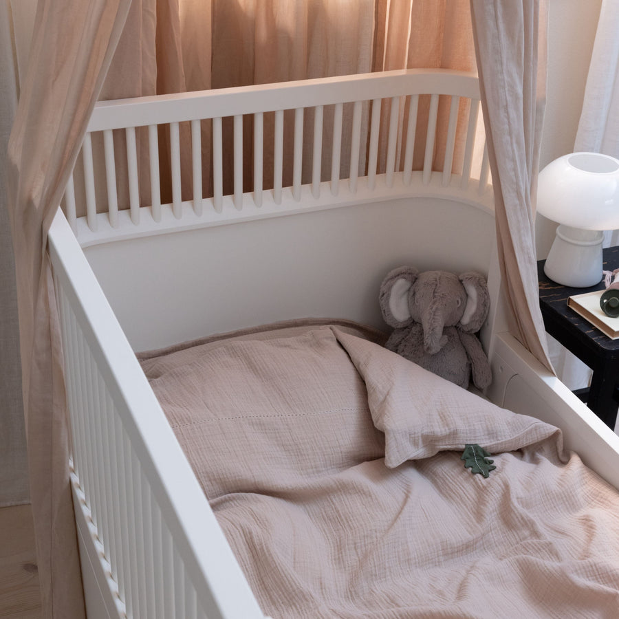Luxury Sebra white baby and junior cot bed, premium beech wood, adjustable height, non-toxic paint, best-selling by Ella James at brixbailey.com
