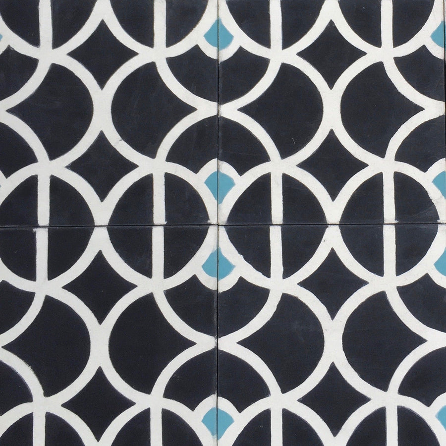 Luxury black and white cement floor tiles, handcrafted Moroccan lotus design, premium sky blue accents, stylish contemporary bathroom kitchen tiles by Maria Starling Design at brixbailey.com