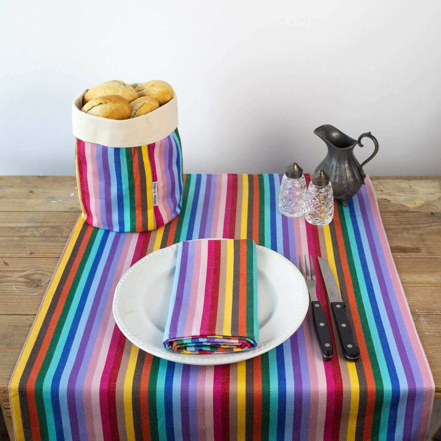 Luxury rainbow table runner, 100% cotton recycled organic, stylish 2.5m long, handcrafted in England, best-selling party decor by Maison Elhoria at brixbailey.com