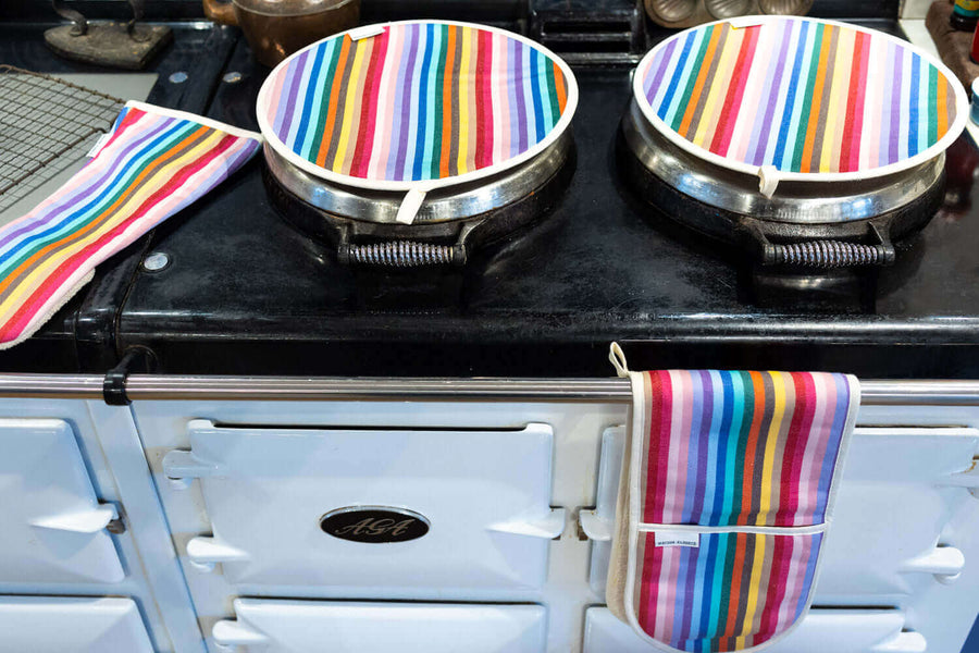 Luxury rainbow chef pad for Aga range cooker, premium heat-retaining hob cover, handcrafted from recycled organic cotton by Maison Elhoria at brixbailey.com