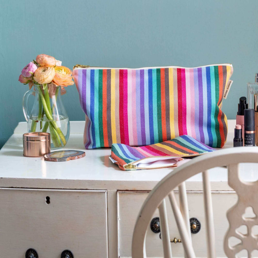 Premium rainbow toiletry bag, luxury British woven organic cotton, waterproof lining, durable zip, versatile for baby essentials, recycled yarns, washable by Maison Elhoria at brixbailey.com