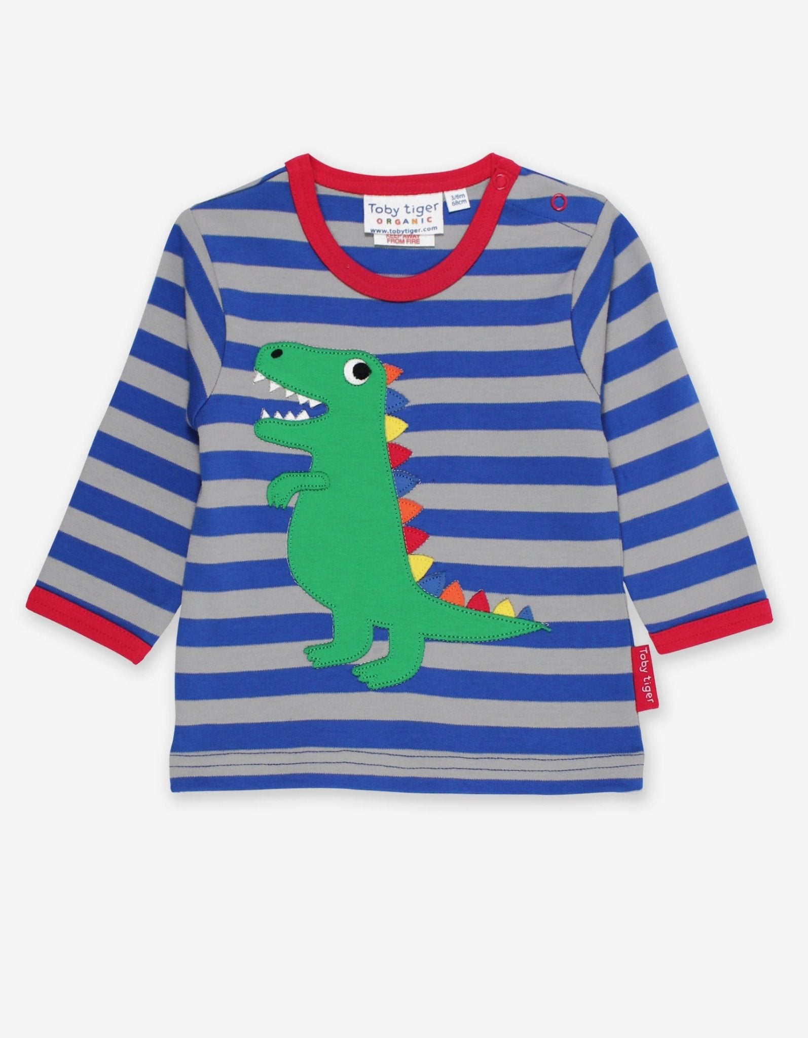 Premium organic cotton long sleeve shirt with stylish T-Rex dinosaur applique, rainbow spikes and sharp teeth design by Toby Tiger at brixbailey.com