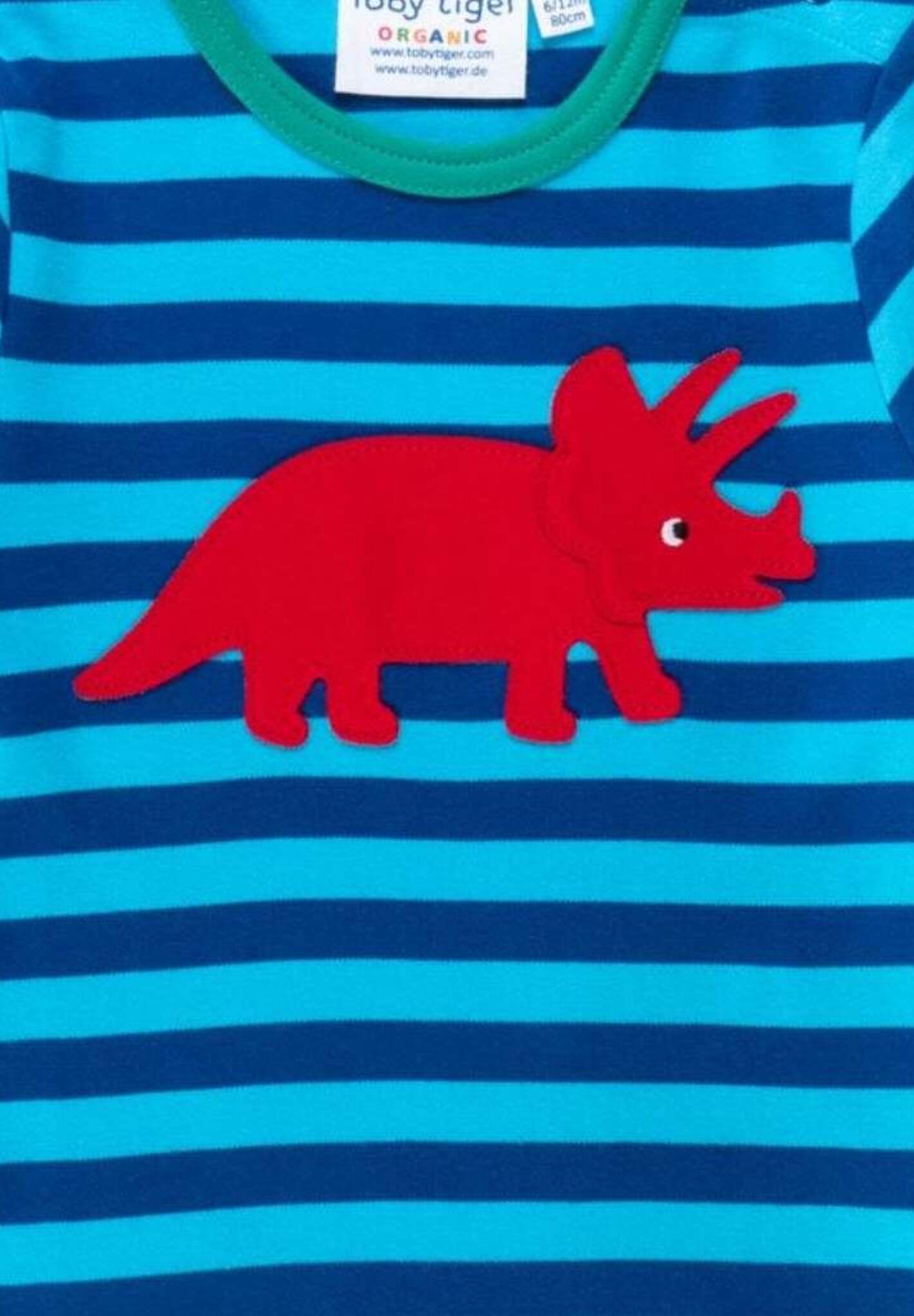 Premium organic cotton long sleeve shirt with embroidered Triceratops applique, stylish stripes, colorful trim, snap neck for easy dressing by Toby Tiger at brixbailey.com