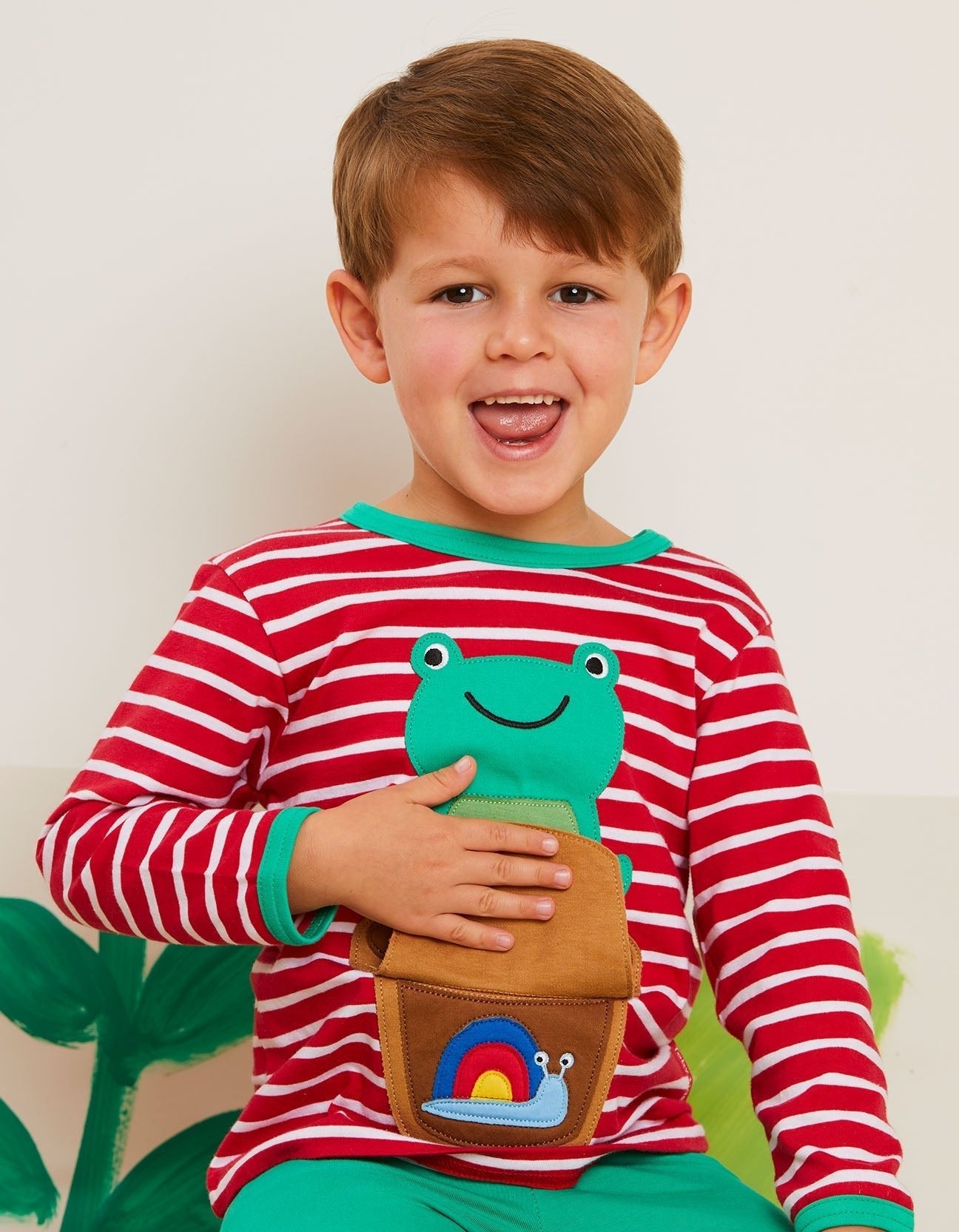 Premium Striped Organic Cotton Baby Romper with Frog Applique and Snap Buttons for Easy Dressing by Toby Tiger at brixbailey.com
