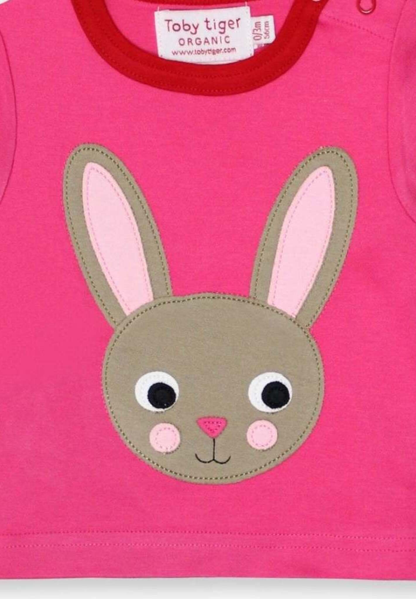 Premium Pink Organic Cotton Long-Sleeve Baby Shirt with Bunny Applique and Surprise Back Detail by Toby Tiger at brixbailey.com