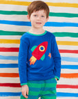 Stylish Blue Long Sleeve Baby Shirt with Colorful Rocket Applique and Planet Print, GOTS Certified Organic Cotton by Toby Tiger at brixbailey.com