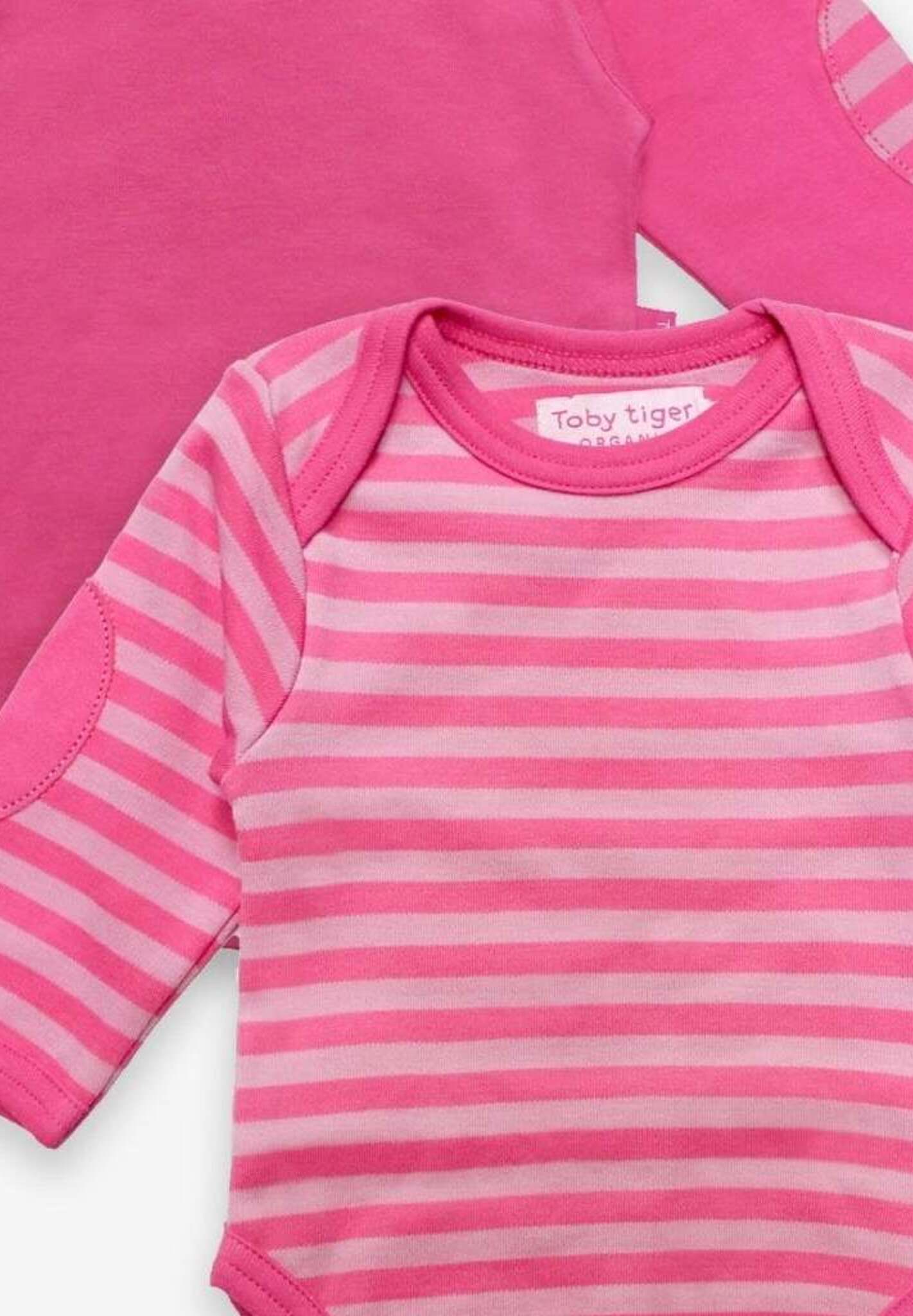 Premium Soft Organic Cotton Long Sleeve Baby Bodysuits in Pink, 2-Pack with Snap Buttons and Easy Neckline by Toby Tiger at brixbailey.com