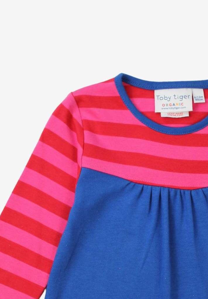 Luxury premium dark blue kids dress with bright pink striped yoke, colorful daisy applique, organic cotton, stylish festive winter wear by Toby Tiger at brixbailey.com