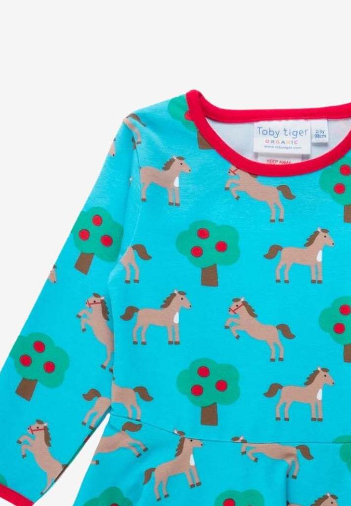 Premium Turquoise Skater Dress with Horse and Apple Tree Print in Organic Cotton for Babies 6-24 Months, Long Sleeves and Snap Buttons by Toby Tiger at brixbailey.com