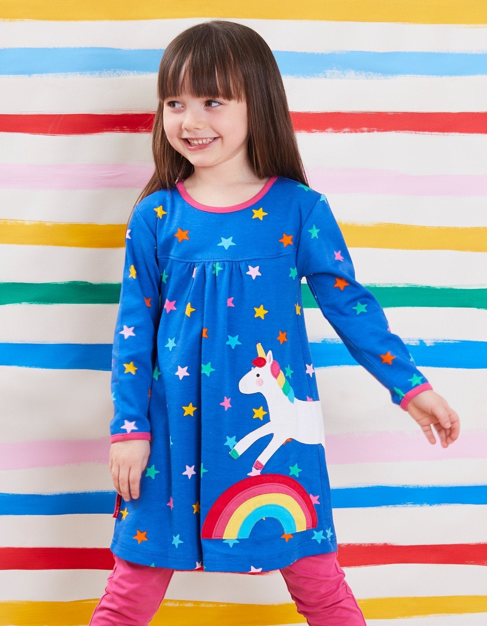 Dreamy Unicorn Rainbow and Star Print Dress for Babies in Soft Organic Cotton with Snap Buttons and Long Sleeves by Toby Tiger at brixbailey.com