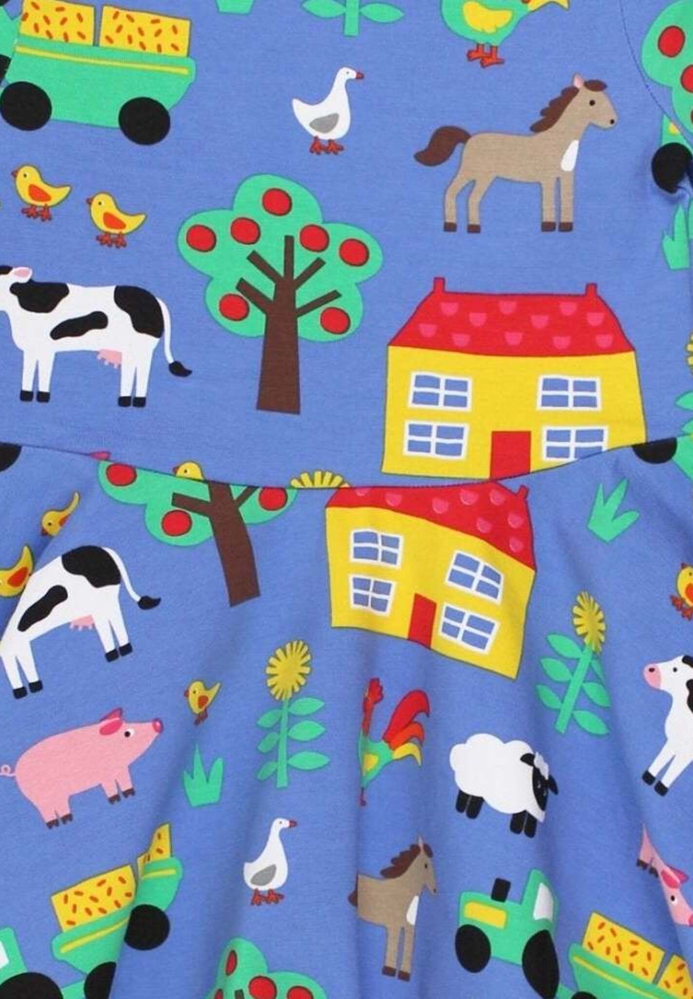 Colorful Farm Animal Print Skater Dress in Soft GOTS-Certified Organic Cotton with Swinging Skirt by Toby Tiger at brixbailey.com
