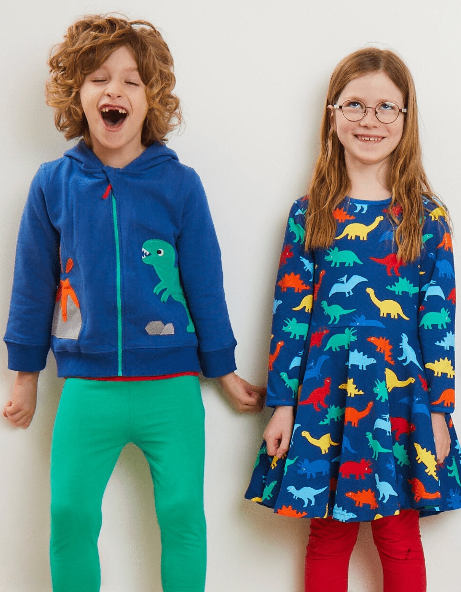 Colorful Dinosaur Print Organic Cotton Skater Dress for Kids, Soft Long Sleeve Eco-Friendly Play Outfit by Toby Tiger at brixbailey.com