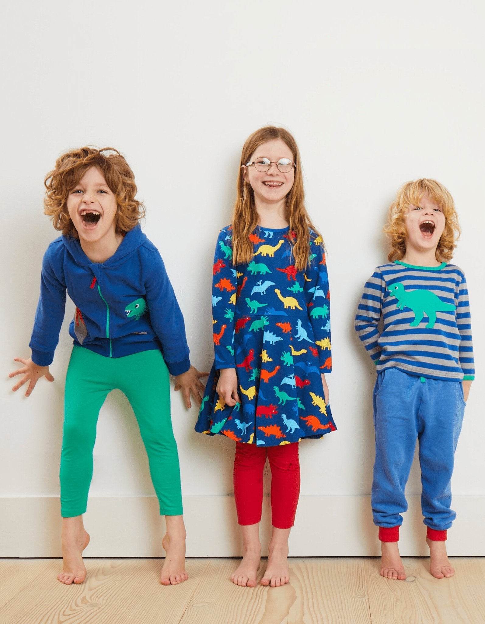 Organic Cotton Dinosaur Skater Dress with Long Sleeves, Soft and Stylish for Playful Adventures, Rainbow Dino Collection by Toby Tiger at brixbailey.com