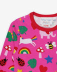 Premium long sleeve baby shirt with colorful dinosaur unicorn elephant print, organic cotton, stylish and comfortable, snap button closure by Toby Tiger at brixbailey.com