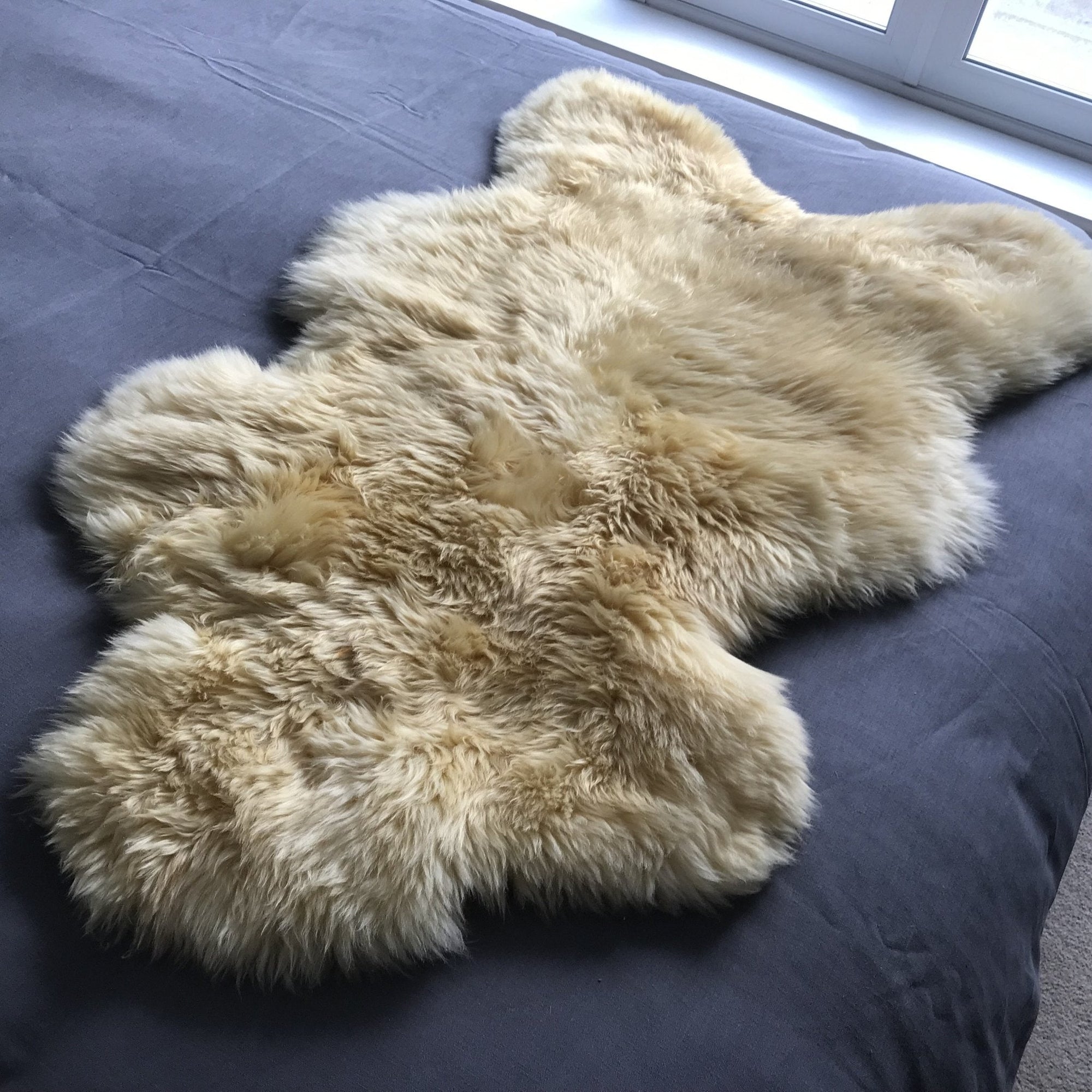 Premium organic baby sheepskin rug, hypoallergenic medical grade, 100% vegetable tanned, long luxurious fur, sustainable free-range wool by Wildash London at brixbailey.com