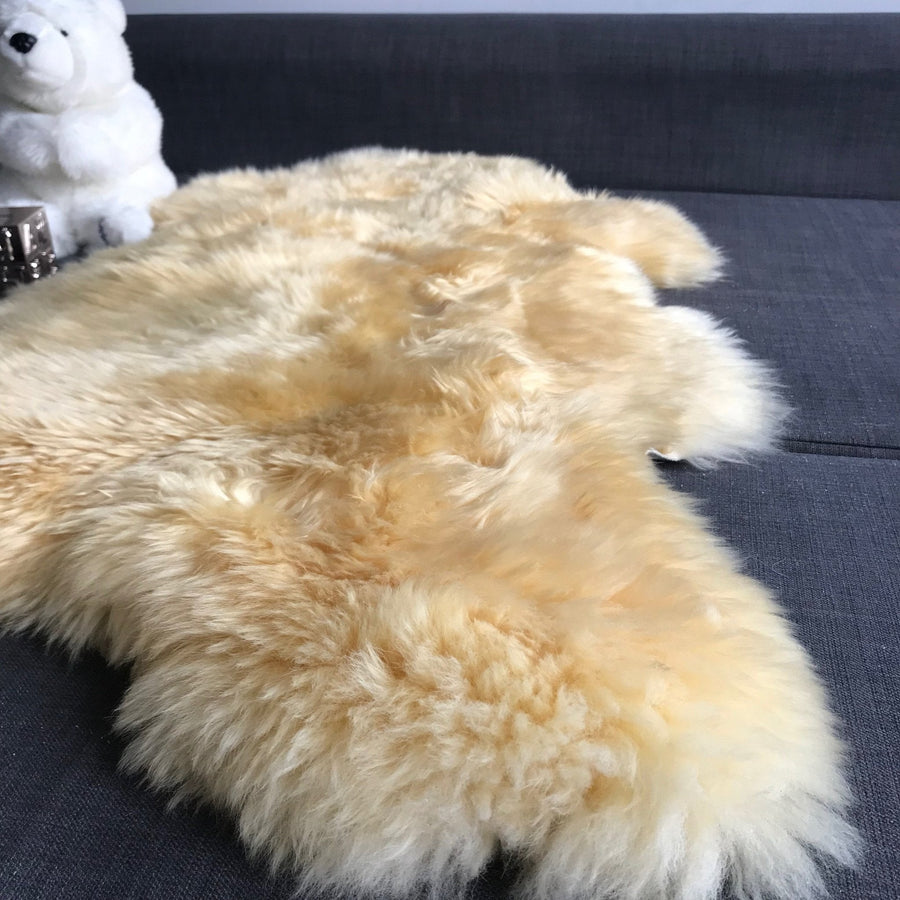 Premium organic baby sheepskin rug, hypoallergenic long fur, 100% vegetable tanned, medical grade, sustainable luxury free-range sheepskin by Wildash London at brixbailey.com