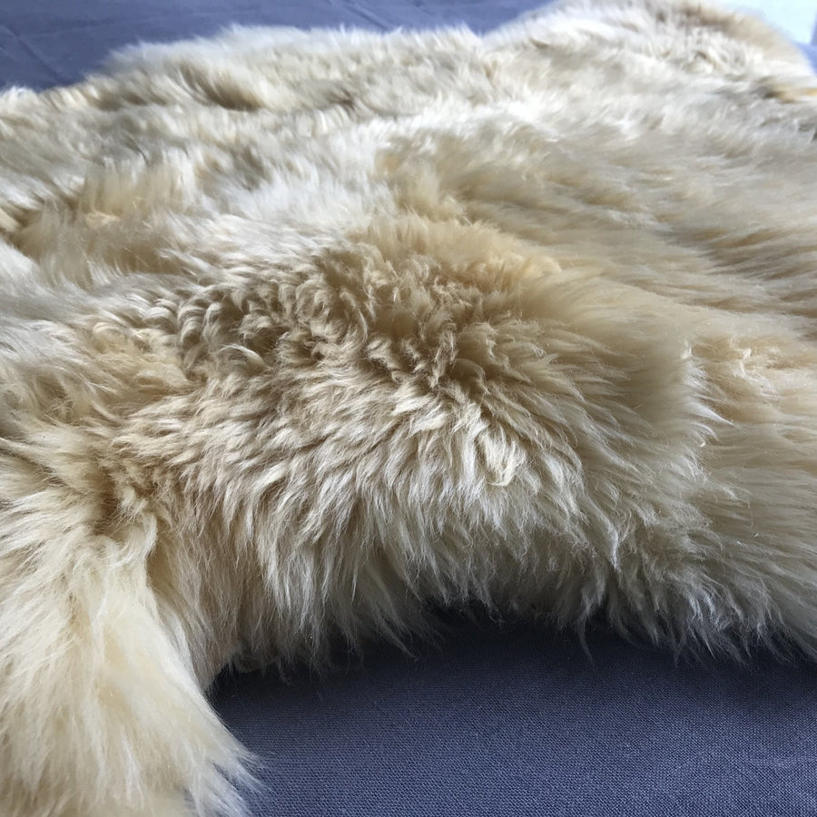 Premium natural baby sheepskin, hypoallergenic and therapeutic, 100% vegetable tanned, long fur, medical grade, sustainable luxury by Wildash London at brixbailey.com
