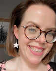 Mini gold star earrings